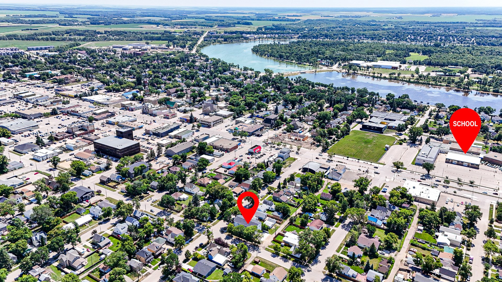 Aerial view of The 59, a three-storey residential building in Portage la Prairie